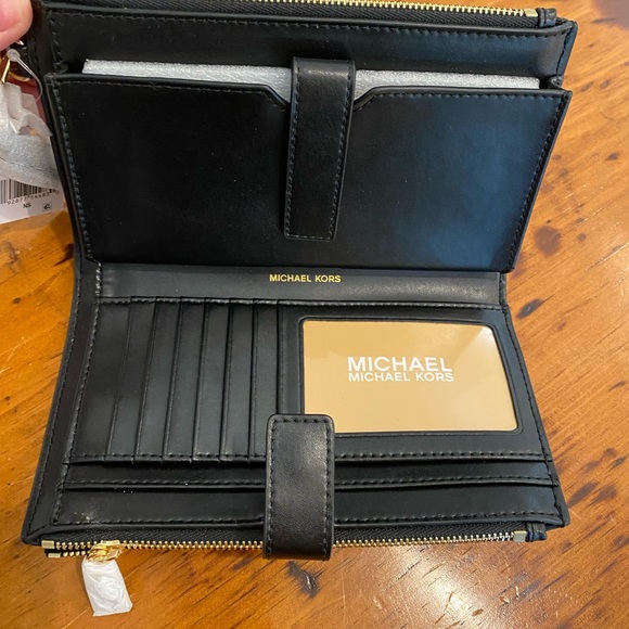 Michael Kors wristlet, black, NWT. Flowers, leather, cutout, quiet luxury - Picture 3 of 5